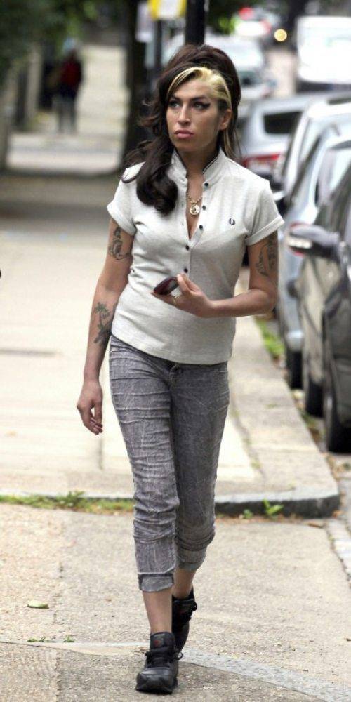 Amy Winehouse - 
Taken in London on July 12, 2011. WInehouse died on July 23, 2011, from alcohol overdose. She was in her London home.