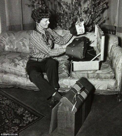 Amelia Earhart - Taken as Earhart packed for her fatal flight. Attempting to make a circumnavigational flight of the world, Earhart disappeared over the Pacific Ocean on July 2, 1937.