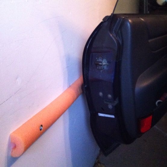 Pool noodle garage extension - 
It probably annoys you every time you open your car door and you end up denting the side of the door or even the garage wall. Well this creative use of an old pool noodle is a fantastic way to absorb the blow and to protect both your garage wall and your car door.