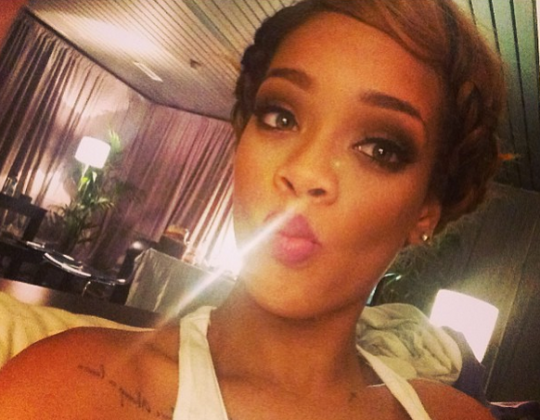 It looks like Rihanna has a little something coming out of her nose.