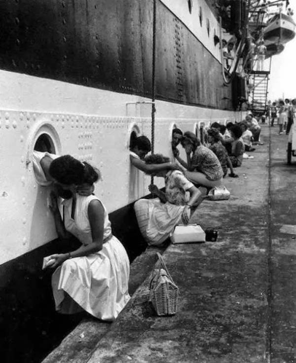 WWII soldiers get their last kiss before being deployed - 1940's.