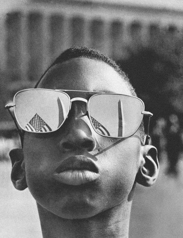 A young boy attends Martin Luther King Jr's "I Have A Dream" speech - 1963.