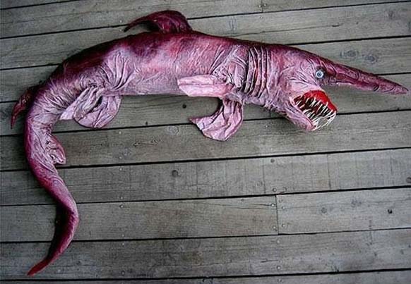 Goblin Shark: These nightmarish sharks live in the ocean at depths greater than 100 m, 330 ft. Adults are found deeper than juveniles. These scary sharks pose no threat to humans but they will haunt your dreams.
