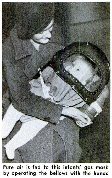 1939: Baby Gas Mask Upgrade. A month away from Germany's invasion on Poland, this upgrade still allows for whoever is holding the infant to control the airflow but with a little more comfort for the kiddo.
