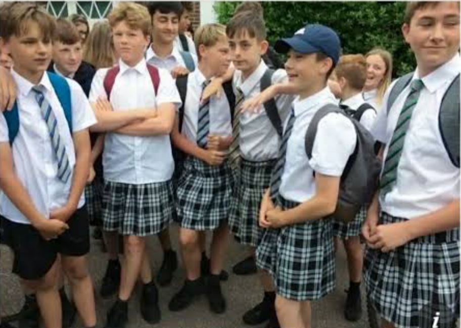Teenage boys wear skirts to school to protest "No Short" rule.