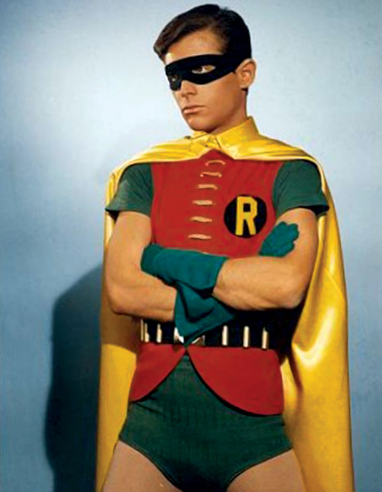 Batman and Robin: Robin. A total badass vigilante who relies on smarts, wealth, and stealth is going to drag along this abomination? Hide in the shadows for evil-doers with a reflective yellow cape? Stay home Robin, I'll call ya.
