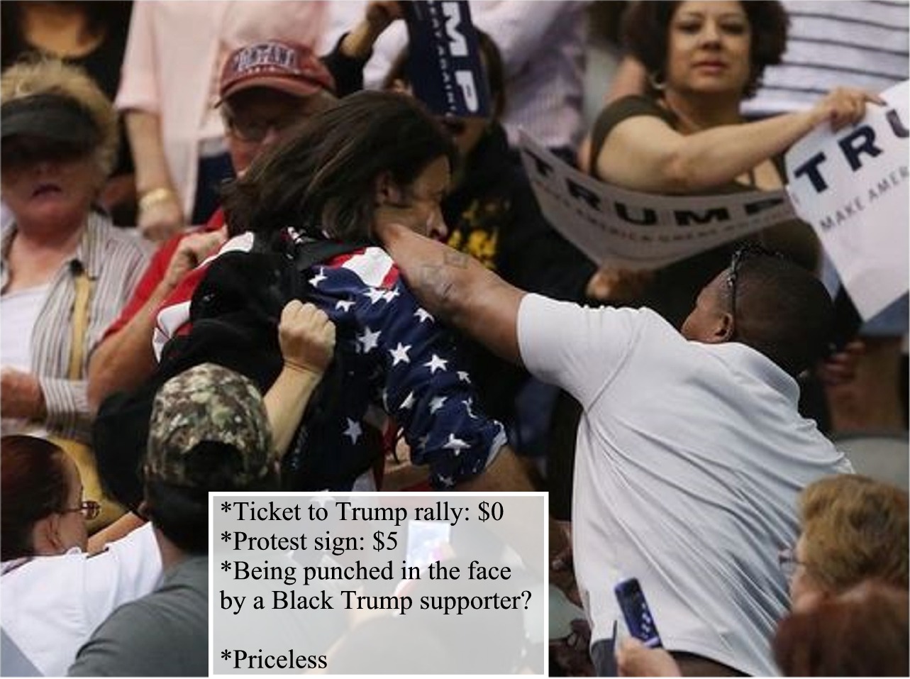 Punched by black supporter. --Oh the irony.