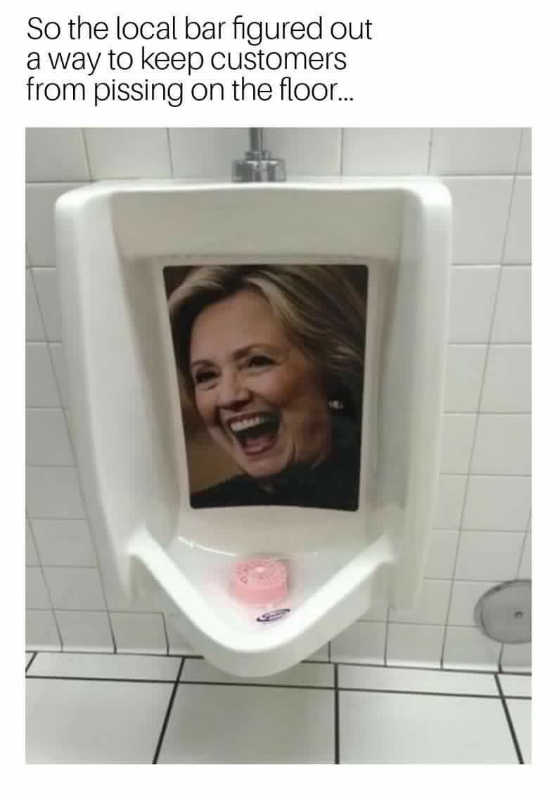 hillary urinal target - So the local bar figured out a way to keep customers from pissing on the floor...