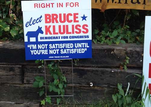 street sign - 1.Tut Right In For elect Bruce Kluliss Democrat For Congress "I'M Not Satisfied Until You'Re Not Satisfied" On Team Kuliss