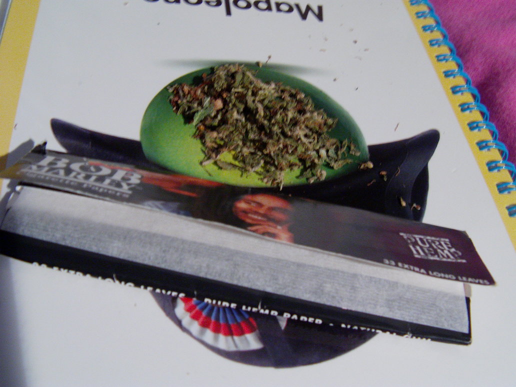 A-lot of people actually dont know the lid flap of your rolling papers is for scooping up and smoothing out the pot before you put it in the paper.