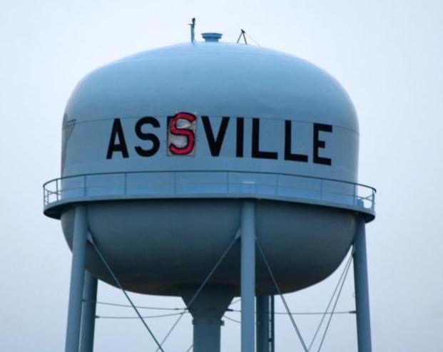 Ashville with sign that changed it to ASSVILLE
