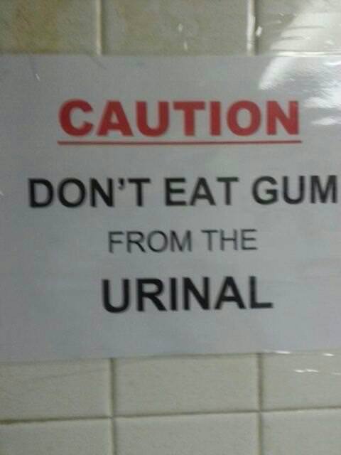 sign - Caution Don'T Eat Gum From The Urinal