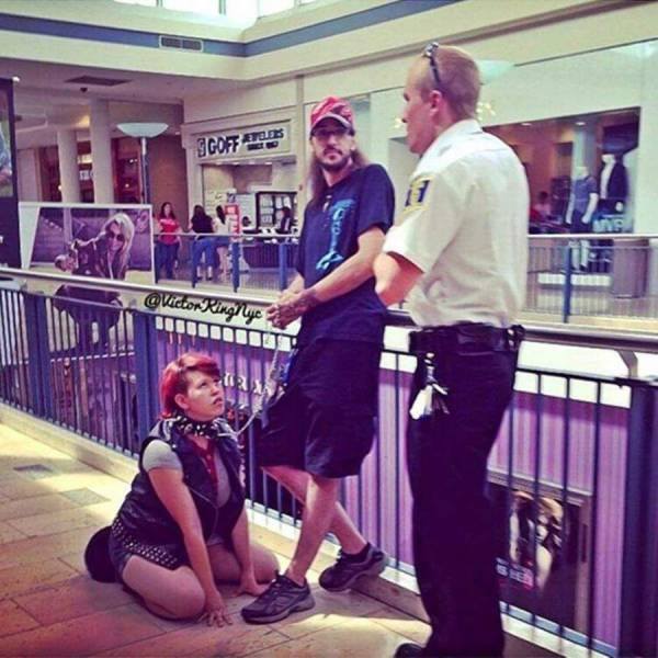 girl on leash in mall