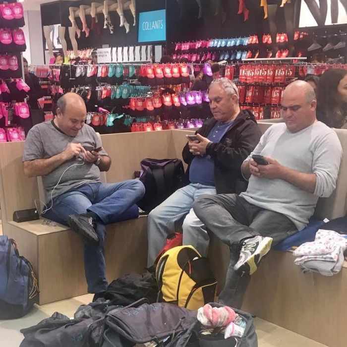 husbands shopping with wives
