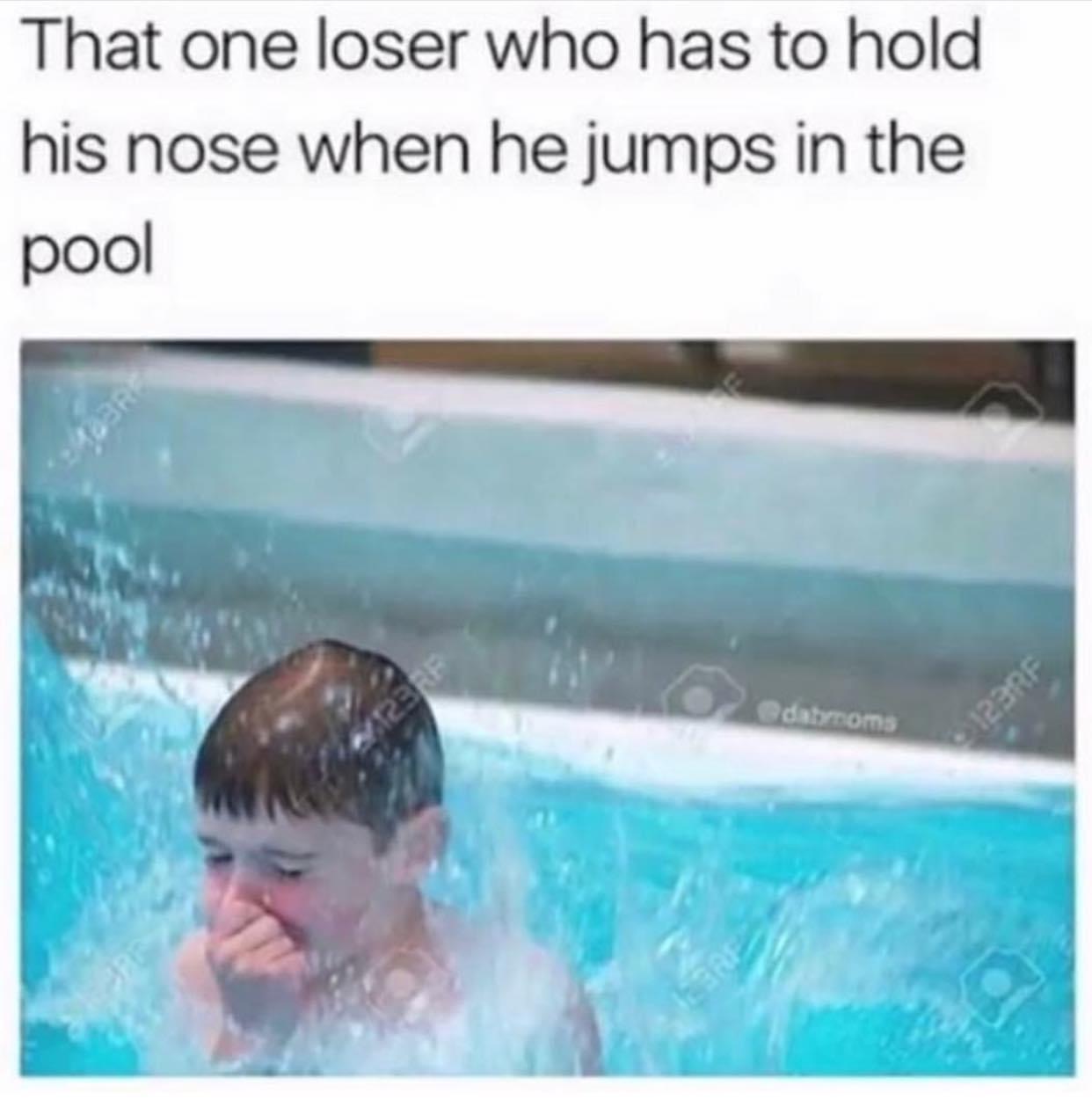 one loser who has to hold his nose - That one loser who has to hold his nose when he jumps in the pool 123RF