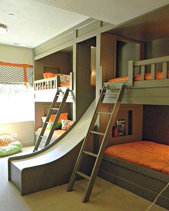 two beds with stairs