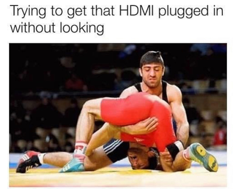 hilarious sports - Trying to get that Hdmi plugged in without looking