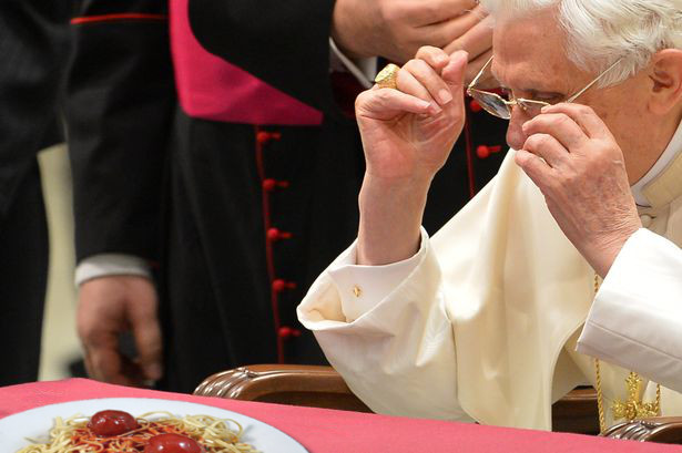 Pope meets the Flying Spaghetti Monster and its noodly appendages.