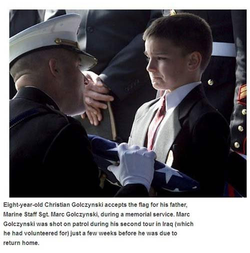christian golczynski - Eightyearold Christian Golczynski accepts the flag for his father, Marine Staff Sgt. Marc Golczynski, during a memorial service. Marc Golczynski was shot on patrol during his second tour in Iraq which he had volunteered for just a f