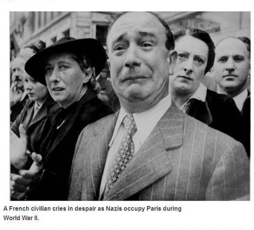 french man crying ww2 - A French civilian cries in despair as Nazis occupy Paris during World War Ii.