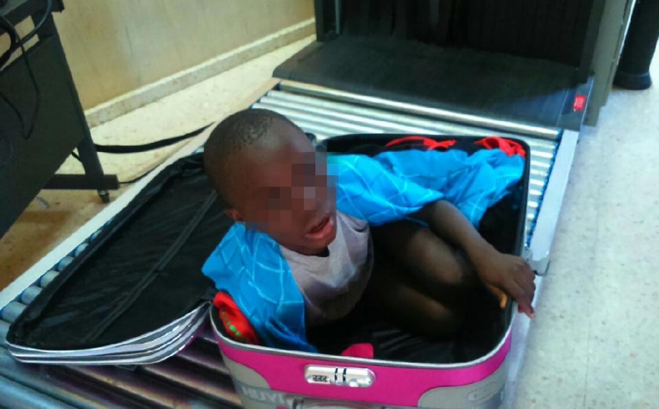 Police found an eight-year-old Ivorian boy hidden in a suitcase that was smuggled across the border into Spanish territory in north Africa, an official said on Friday.