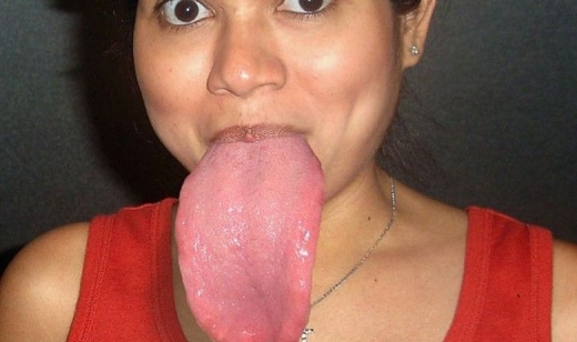 female with a very big tongue