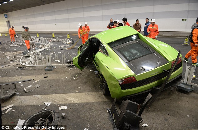 Two unemployed men who crashed a Lamborghini and Ferrari as they reportedly staged a "real-life Fast and Furious" race through Beijing were sentenced to jail Thursday for dangerous driving, the court said.