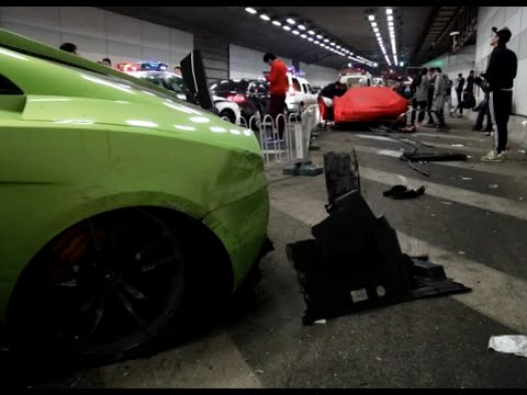 According to reports a woman passenger in Tang Weitian's green Lamborghini was left with a broken spine in the accident. The other driver Yu Muchun, 20, drove a red Ferrari.