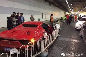Pictures of the high-performance cars' mangled wreckage in a tunnel in the Chinese capital provoked intense public interest, especially when police announced the men were unemployed.