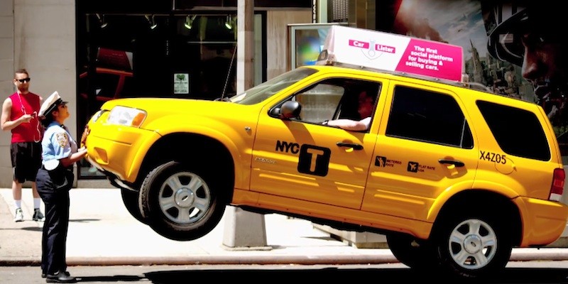 Tiny traffic cop shocks New Yorkers by lifting taxi off the ground,It's a really average New York City scene.