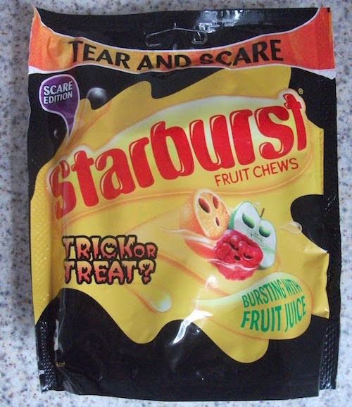 STARBURST...This is just one example of the hundreds of candy companies that make special "Halloween" versions of candy, which is insane, because surely they know people would buy just the regular candy to give to trick-or-treaters anyway? Right? What is particularly egregious about this Spooky Starburst, though, is that it is clearly NOT marketed for trick-or-treaters. It's a just a large-ass personal bag of Starbursts that you're supposed to eat by yourself at Halloween time. In fairness to the company, that is spooky, since diabetes is real and can kill you