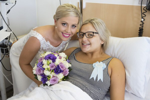 A bridesmaid went into labor early, so the bride brought the wedding to her
