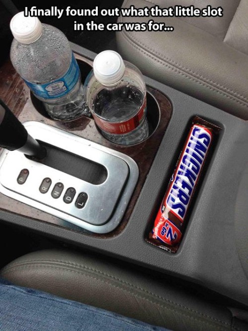 strangely satisfying - I finally found out what that little slot in the car was for... Snickers