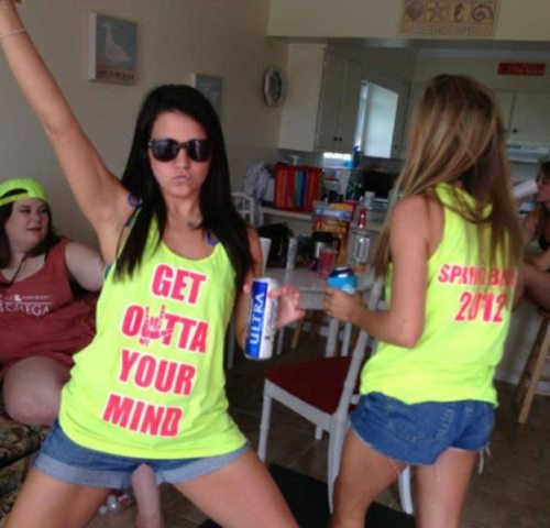 Girls dancing with shirt saying Get Outta Your Mind
