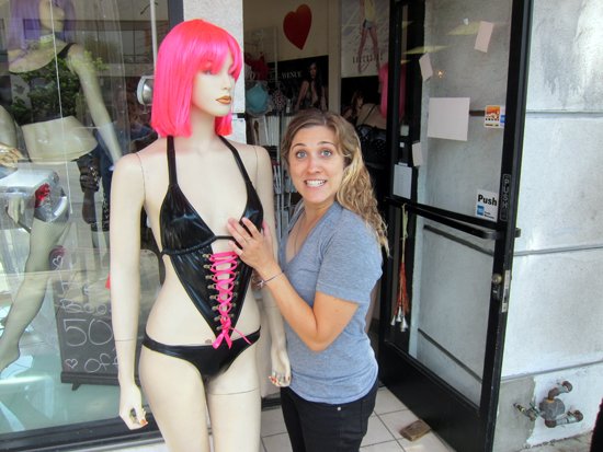 Funny picture of a girl getting dirty with a mannequin