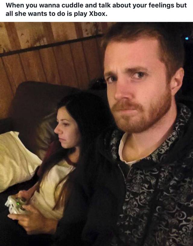 photo caption - When you wanna cuddle and talk about your feelings but all she wants to do is play Xbox.