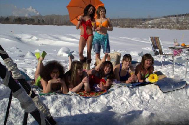 funny picture of girls posing in bikinis in the snow