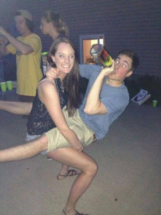 funny picture of couple dancing and drinking