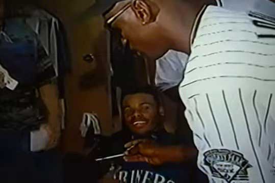 Michael Jordan asks for Ken Griffey Jr.'s autograph.