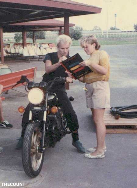 Gwen Stefani getting an autograph from STING!