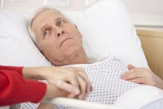 old man and daughter in hospital