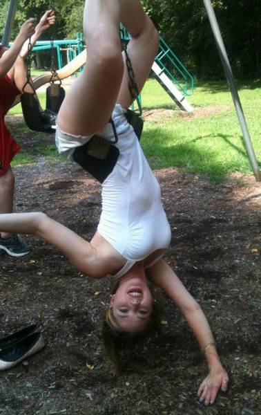 memes - girl gets stuck in a child's swing in a park