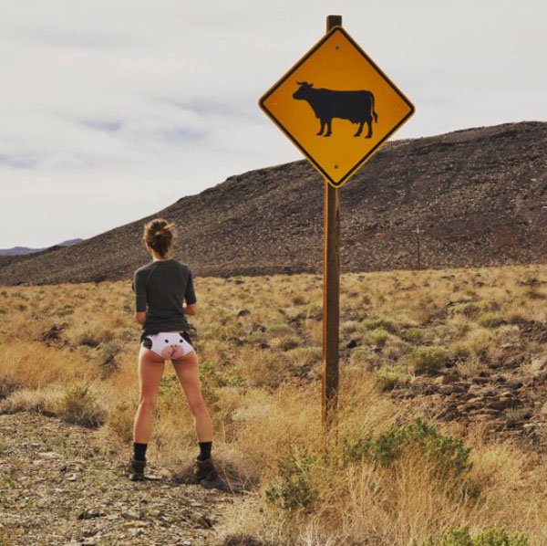 Girl Travels the World in Her UDDERPANTS. (3)
Watch out for cows crossing while in Death Valley, California