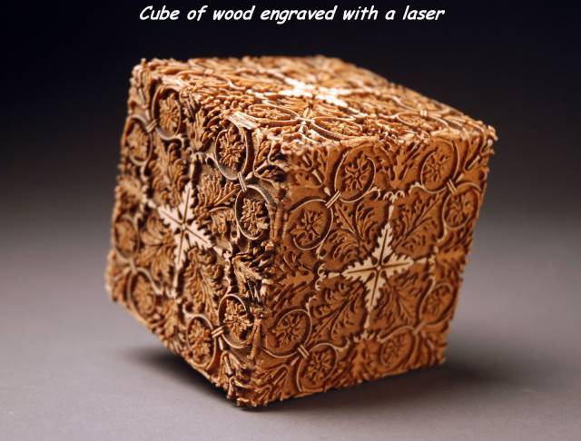 Cube of wood engraved with a laser