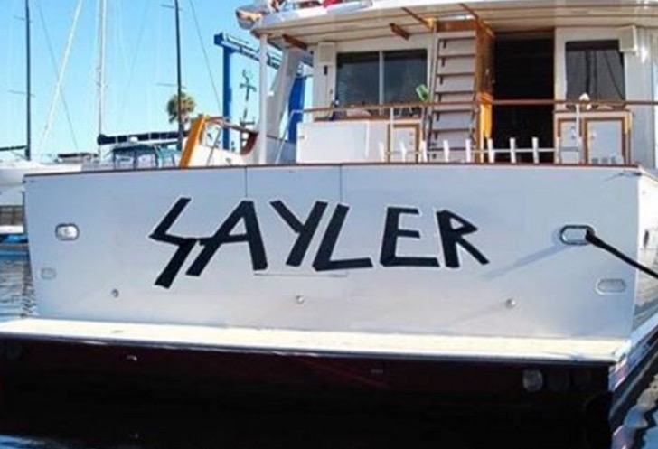 Slayer style font on a boat that says Sayler