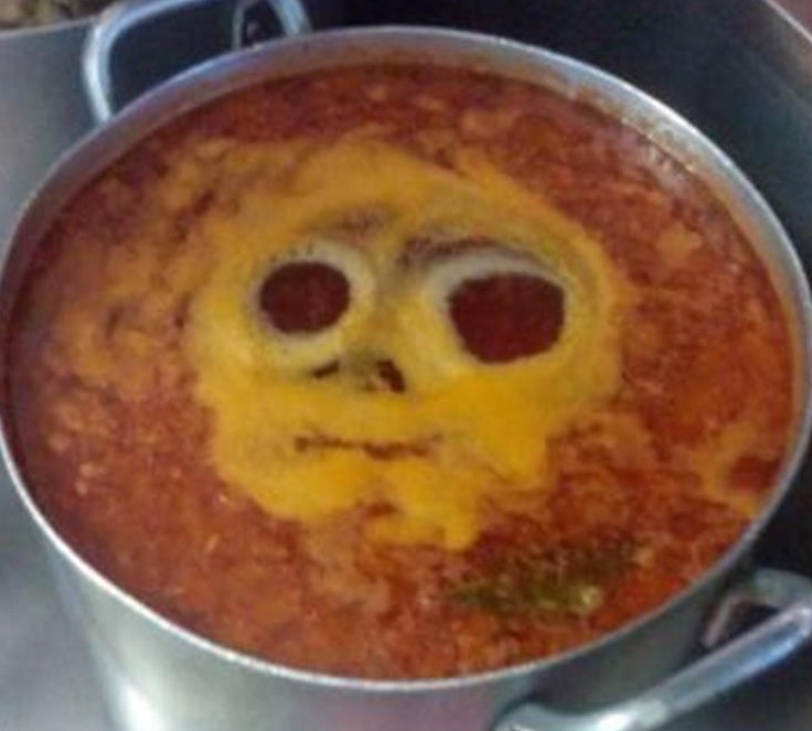 doe eyed scary face made in the egg of the shakshouka