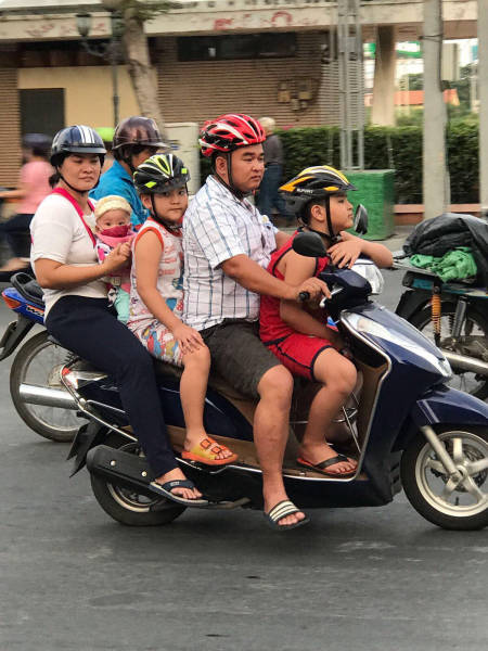 vietnamese family on scooter