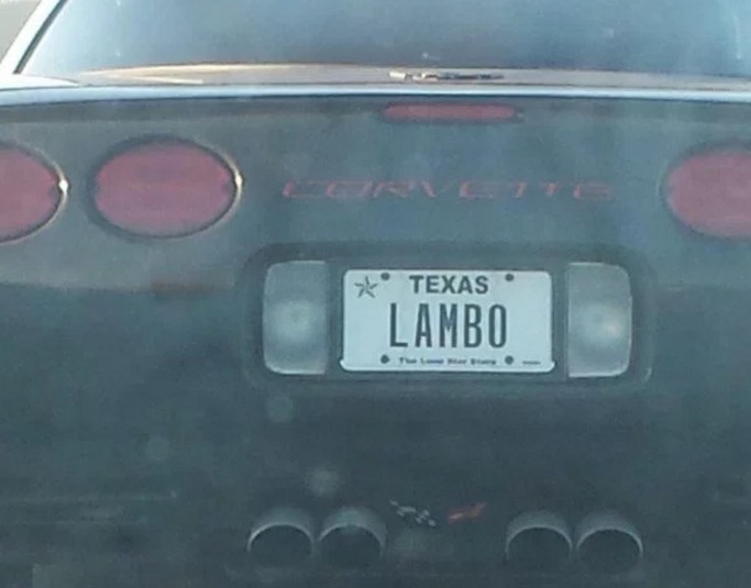 Black Corvette with Texas license plate LAMBO
