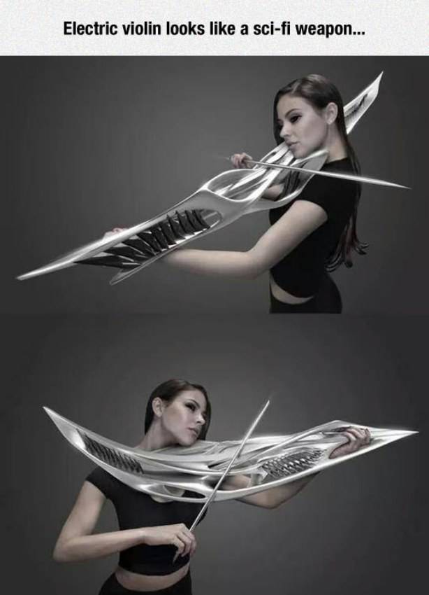 Woman playing an electric violin which looks like some kind of sci-fi weapon