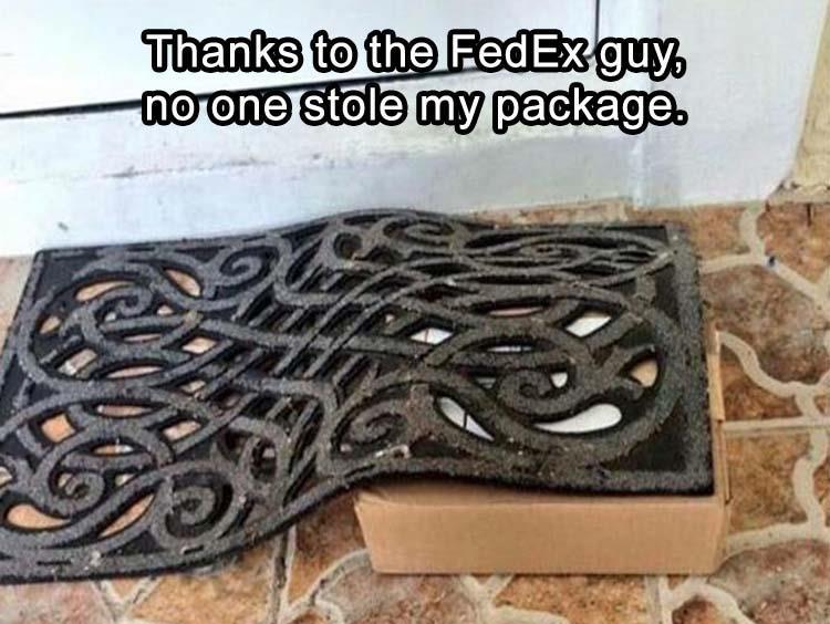 Fedex guy put the package under the floor mat.